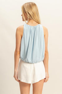 BUBBLE HEM TOP